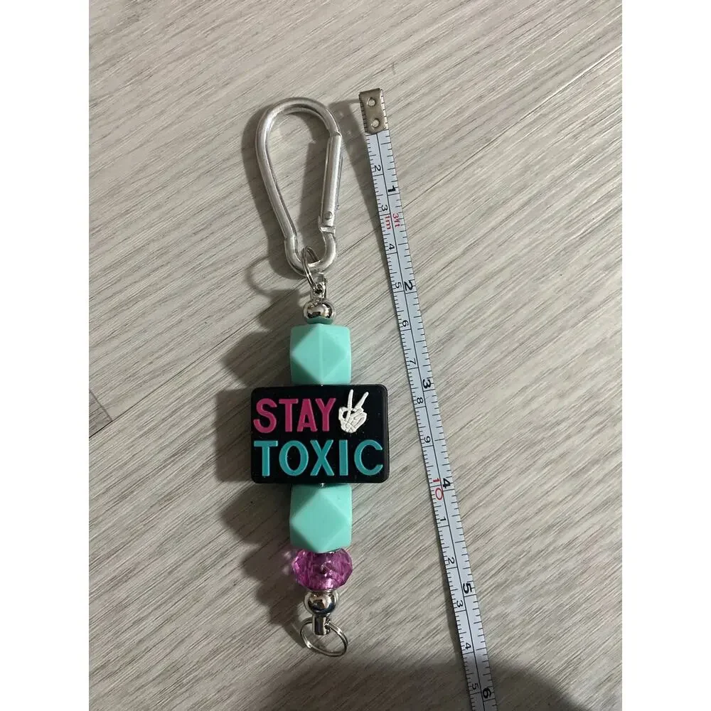 Stay toxic purse charm keychain
